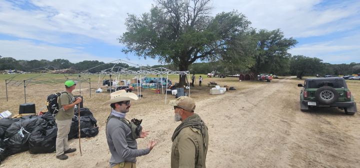 A volunteer is interviewed at a debris staging area